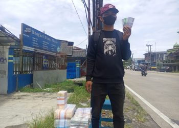 Pedagang Uang Pecahan Rupiah Menjamur di Cikupa