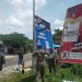 Langgar Aturan, Bawaslu Lebak Tertibkan Spanduk yang Terpasang di Pohon dan Tiang Listrik
