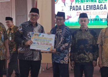 Bantuan Dana Hibah Disalurkan, Ini Pesan Helldy Agustian