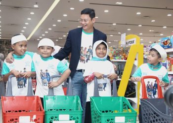 BSI Ajak 140 Anak Yatim Berbagi Kebahagian, Kenalkan dan Ajarkan Literasi Transaksi Syariah