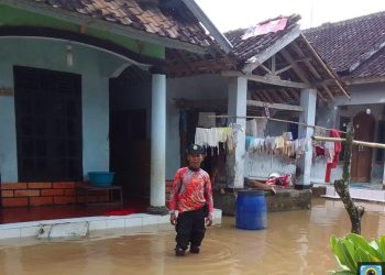 Kondisi banjir di Desa Rancasanggal, Kecamatan Mancak.