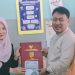 Sukseskan Gemar, Kepala DP2KBP3A Pandeglang Ambil Rapor Anaknya