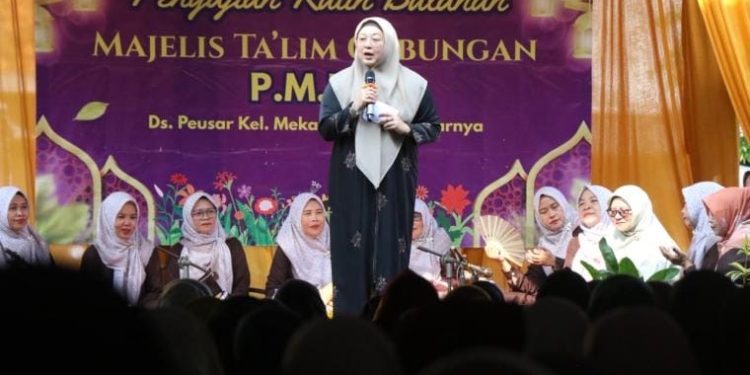 Intan saat menghadiri pengajian bulanan Majelis Taklim Gabungan Desa Peusar, Minggu 28 Juni 2026.